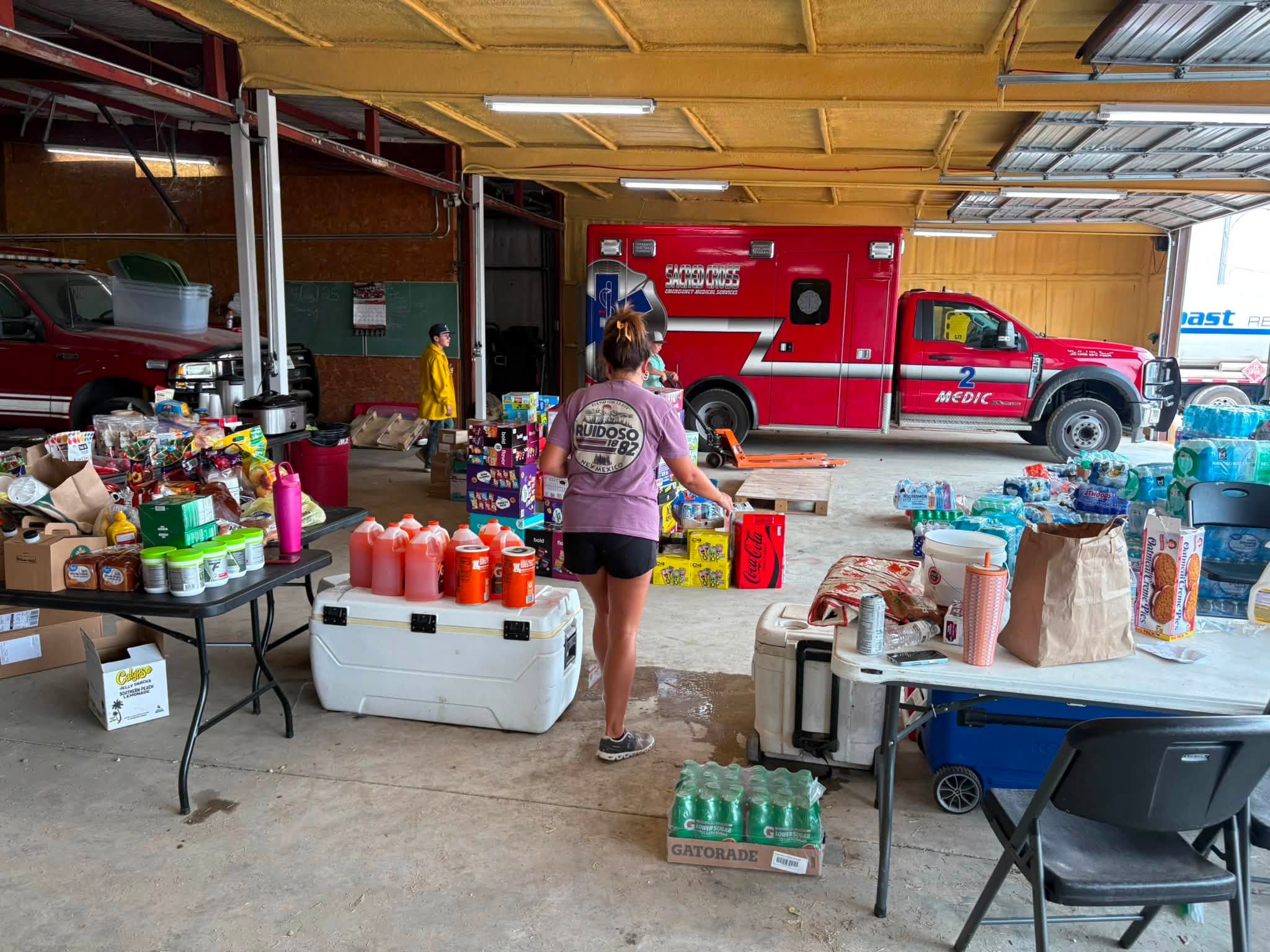 Relief supplies on tables inside the fire station during Patrick's Graford delivery.